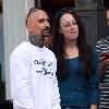 Robert LaSardo 
outside a movie theater with his girlfriend.