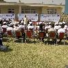 Catherine Mbengue head of UNICEF in Afghanistan and Raees Ahmadzai 'UNICEF Peace Day' celebrations at a Children's Cricket Camp hosted by the Afghan national cricket team. Kabul.