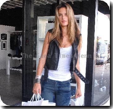 Victoria's Secret model Alessandra Ambrosio shopping at Trunkshow LA, a discount designer store in Santa Monica, with her daughter.Los Angeles.