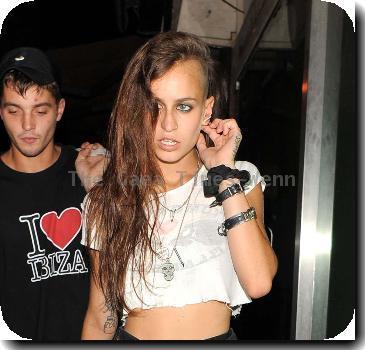 Alice Dellal 
leaves the Proud Gallery in North London.