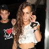 Alice Dellal 
leaves the Proud Gallery in North London.