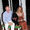 Ellen and Chuck Scarborough and their dog Oliver 
ARF benefit at the Bridge hampton Tennis and Surf Club.