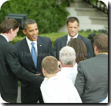 President Barack Obama welcomes NASCAR drivers to the South Lawn at the White House.