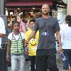 Common takes his daughter Omoye Assata Lynn shopping in Hollywood..
