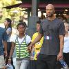 Common takes his daughter Omoye Assata Lynn shopping in Hollywood..