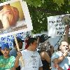 Coptic Americans (Egyptian Christians) hold rally in Lafayette Park to raise concerns about religious freedom and related human rights issues during Egyptian President Hosni Mubarak's visit to the White House.