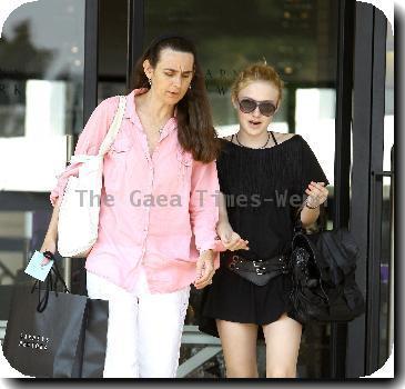 Dakota Fanning 
shopping with her mother at Barney's New York.