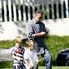 Cruz Beckham, Victoria Beckham and David Beckham's children playing golf at a park in Beverly Hills Los Angeles.