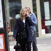 Fiona Phillips chats on her mobile phoneas she takes a stroll near her homeLondon.