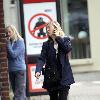 Fiona Phillips chats on her mobile phoneas she takes a stroll near her homeLondon.