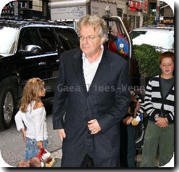 Jerry Springer poses for photographs as he arrives at his Manhattan hotelNew York City.