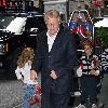 Jerry Springer poses for photographs as he arrives at his Manhattan hotelNew York City.