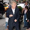 Jerry Springer poses for photographs as he arrives at his Manhattan hotelNew York City.