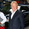 Jerry Springer poses for photographs as he arrives at his Manhattan hotelNew York City.