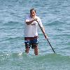 Jon Favreau spends a day paddleboarding on Malibu Beach. Los Angeles, California.