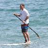 Jon Favreau spends a day paddleboarding on Malibu Beach. Los Angeles, California.