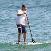 Jon Favreau spends a day paddleboarding on Malibu Beach. Los Angeles, California.