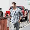 Kellan Lutz is all smiles as he leaves Bardot nightclub in Hollywood after a photoshoot for H&M clothing wearing a white vest top.Los Angeles, California.