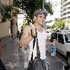 Kellan Lutz is all smiles as he leaves Bardot nightclub in Hollywood after a photoshoot for H&M clothing wearing a white vest top.Los Angeles, California.