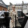 Kylie Minogue
leaves her apartment and heads to a West London office
wearing a stunning leopard print coat.