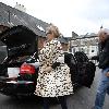 Kylie Minogue
leaves her apartment and heads to a West London office
wearing a stunning leopard print coat.