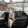 Kylie Minogue
leaves her apartment and heads to a West London office
wearing a stunning leopard print coat.