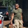 Laurence Fishburne and his family visit Mr. Bones Pumpkin Patch to select a pumpkin for Halloween Los Angeles.