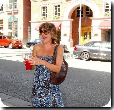 Lisa Rinna drinking a cold beverage while on Bedford AvenueLos Angeles.