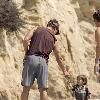 Matthew McConaughey plays with his son, Levi, on a beach in MalibuLos Angeles.