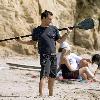 Matthew McConaughey soaks up the Southern California sun playing with his dogs and exercising along Malibu beach.