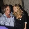 Mickey Rourke leaving Mahiki nightclub with a mystery blonde.