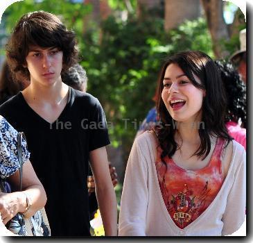 Miranda Cosgrove shopping in Hollywood with her friends and familyCalifornia.