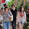 Miranda Cosgrove shopping in Hollywood with her friends and familyCalifornia.