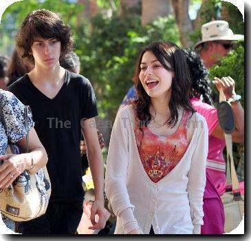 Miranda Cosgrove shopping in Hollywood with her friends and familyCalifornia.