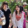 Miranda Cosgrove shopping in Hollywood with her friends and familyCalifornia.