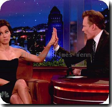 Kate Beckinsale
talks about her new movie 'Whiteout' and how she is easily frightened. She jokes that she makes her boyfriend put a collar with a bell on. Conan tells her that he is impressed how well she can handle a hand gun. Kate says that she has abnormally large hands, and shocks Conan when she proves to him that her hands are larger than his on NBC's 'The Tonight Show with Conan O'Brien' 
USA