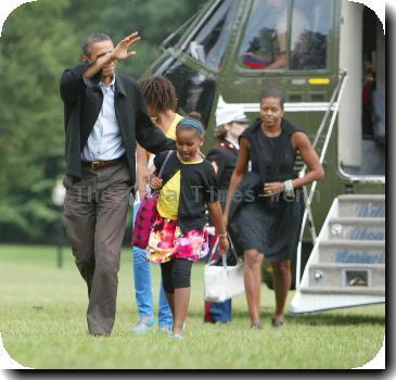 President Barack Obama, daughter Sasha Obama and wife