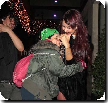 Peaches Geldof in a fit of giggles as she is hugged by a fan as she returns to her London Hotel London.