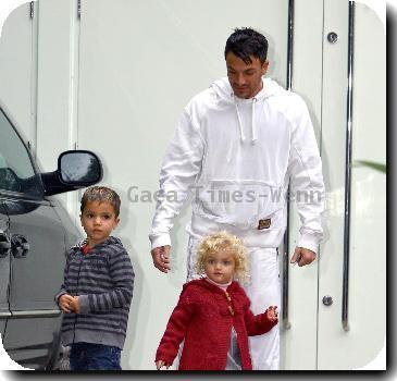 Peter Andre and his children Junior and  Princess Tiaamii arriving home London.