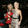 Sarah Harding at the May Fair  Hotel, and then on her own at Movida. London.