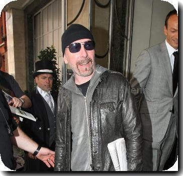 The Edge leaving Claridges hotel in Mayfair..