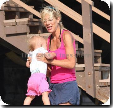 Tori Spelling and Dean McDermott enjoys a day on Malibu Beach with their children.Los Angeles, California.