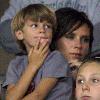 Victoria Beckham watches her husband David Beckham play at the LA Galaxy v Chivas game at the Home Depot Center with her son Romeo.Carson California.