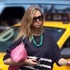 Whitney Port
seen walking through Soho talking on her phone..