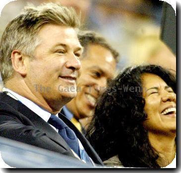 Alec Baldwin watching Maria Sharapova of Russia against Christina McHale of the United States during day four of the 2009 U.S. Open at the USTA Billie Jean King National Tennis Center on September 3, 2009 in Flushing Meadow, USA.Sharapova went on to win the match 6-2, 6-1 New York City.