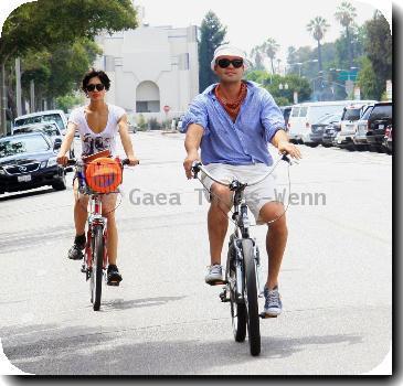 Billy Zane and his girlfriend ride bicycles in Beverly HillsLos Angeles.