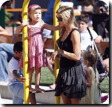 Denise Richards takes her daughters to a park in MalibuCalifornia.