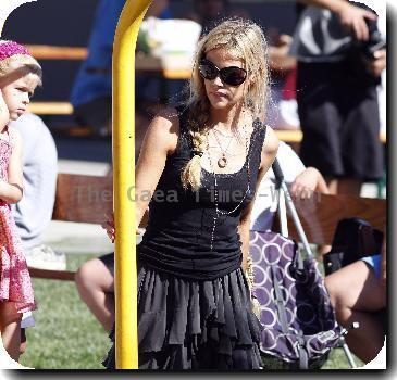 Denise Richards takes her daughters to a park in MalibuCalifornia.