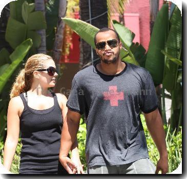 **Exclusive**Donald Faison and Cacee Cobb holding hands while out walking in West HollywoodLos Angeles.