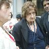 Iconic journalist Helen Thomas in conversation with colleagues Washington DC, USA –